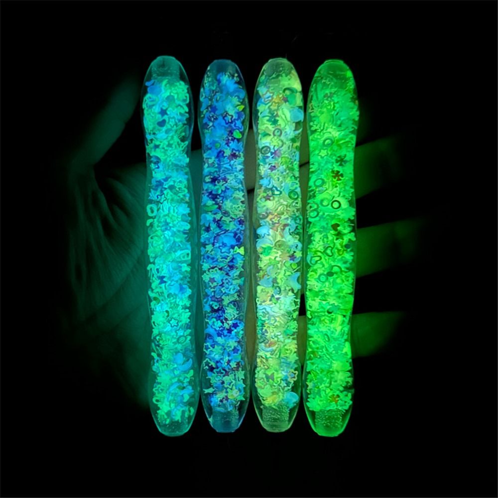 Pluma de resina brillante en la oscuridad